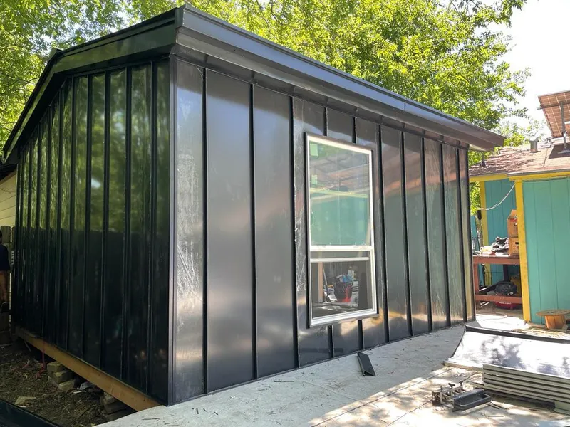 Black standing seam metal wall panels for Roof Inspection in Lochearn